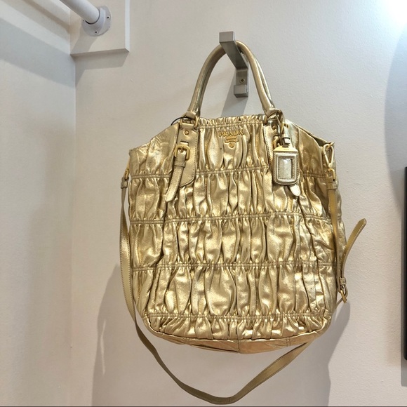 prada gold purse